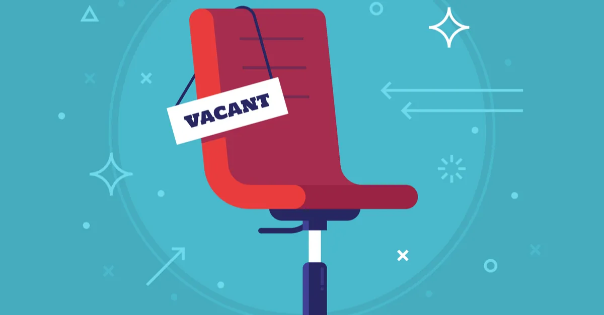 afbeelding van bureaustoel met bordje vacant eraan